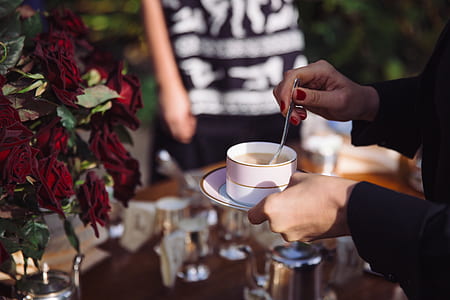 woman mixing coffee thumbnail