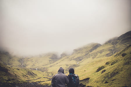 two person facing mountain thumbnail