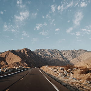 road going to mountain range thumbnail