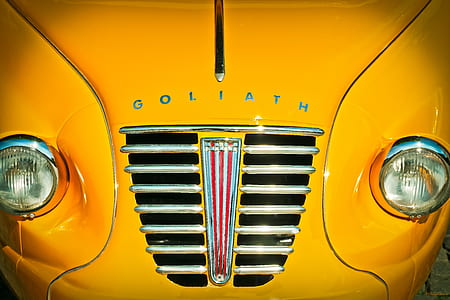 close-up photo yellow Goliath vehicle thumbnail