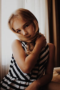 girl holding her hair thumbnail