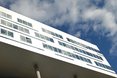 worm's eye view photography of white building thumbnail