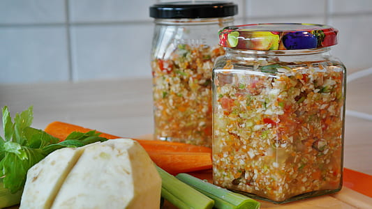 jars beside vegetables thumbnail