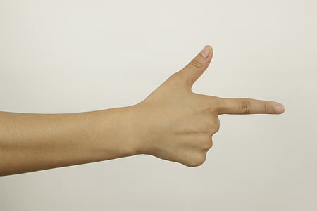 person showing hand gun thumbnail