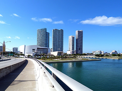 high-rise buildings near body of water during daytime thumbnail