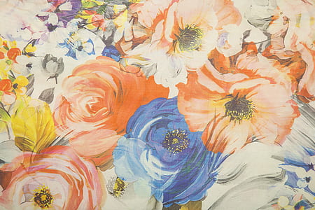 close up photo of blue and orange floral painting thumbnail