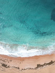 aerial view of the beach during day thumbnail