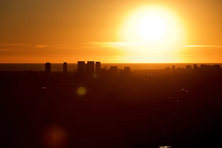 silhouette photo of building under golden hour thumbnail