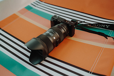 black Sony DSLR camera thumbnail