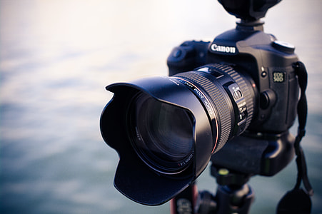 black Canon EOS 540 DSLR camera thumbnail