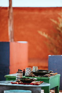 tilt-shift photography of tableware on table at daytime thumbnail