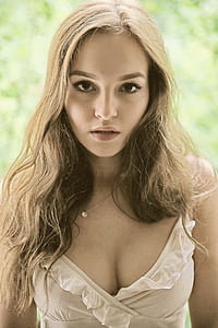 woman wearing gray deep-v-neck dress thumbnail