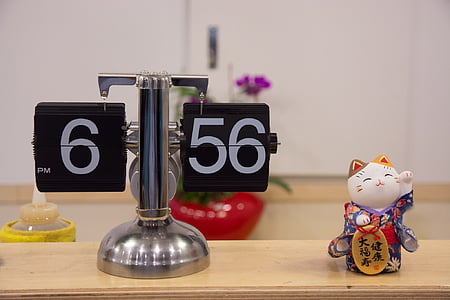 6:56 time on brown wooden table thumbnail