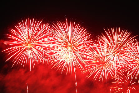 photo of red fireworks in sky thumbnail