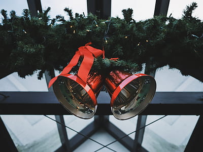 selective photo of Christmas bell and garland thumbnail