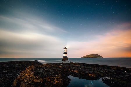photo of white and brown lighthouse thumbnail