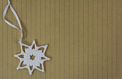 white star decor on brown surface thumbnail