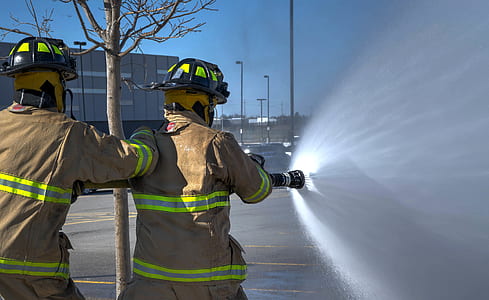 firemen using water hose thumbnail