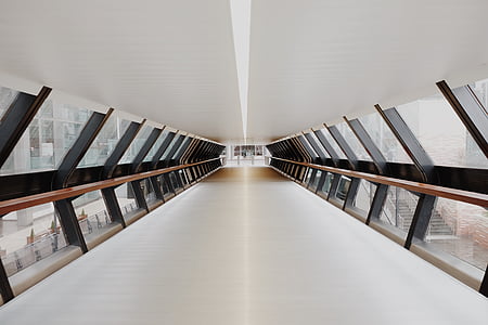 white concrete floor surrounded by glass wall thumbnail