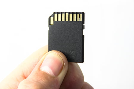 person holding SD card thumbnail