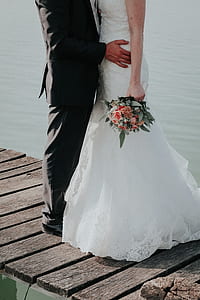 person standing near body of water thumbnail