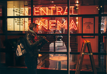 closeup photo of man standing near store thumbnail
