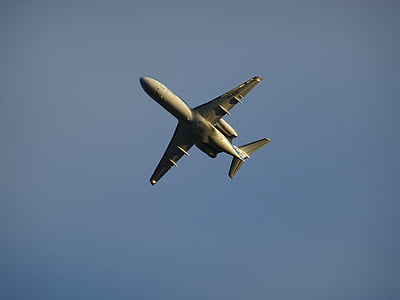 low-angle photography of white passenger airplane thumbnail