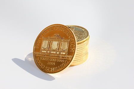 round gold-colored coins thumbnail