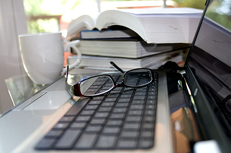 eyeglasses on computer keyboard thumbnail