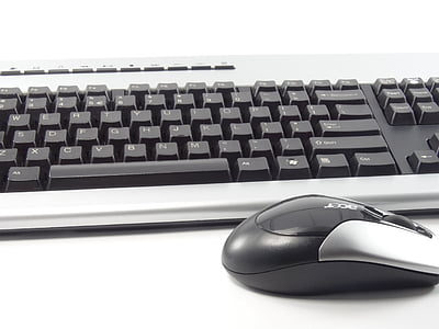 black computer keyboard and mouse on white surface thumbnail
