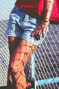 closeup photo of woman wearing blue denim short shorts thumbnail