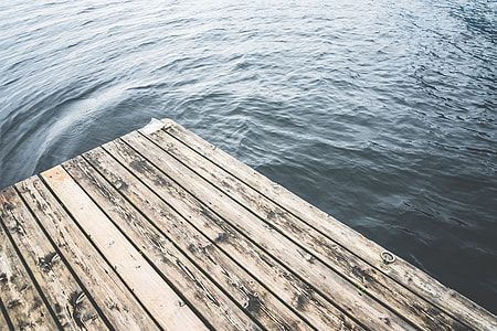 Minimalistic Shot of a Wooden Pier on a Lake thumbnail
