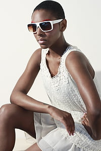 woman wearing white v-neck sleeveless mini dress thumbnail