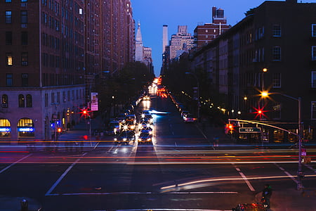time-lapse photography of passing vehicles on intersecting roads thumbnail