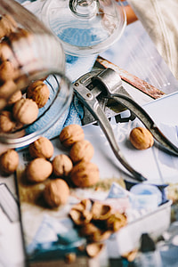 Jar full of walnuts with a fresh healthy shake and musli in a bowl thumbnail