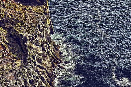 mountain beside body of water thumbnail