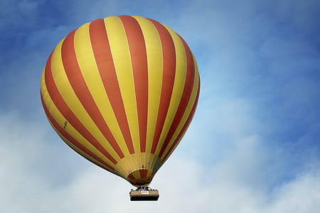 low angle photography of hot air balloon on sky thumbnail