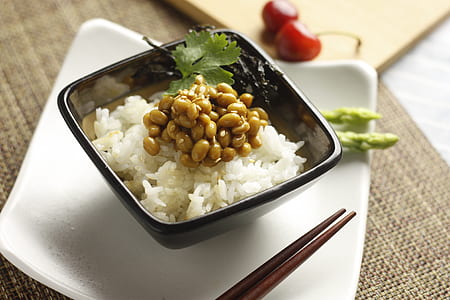 cooked rice with cooked beans on top thumbnail