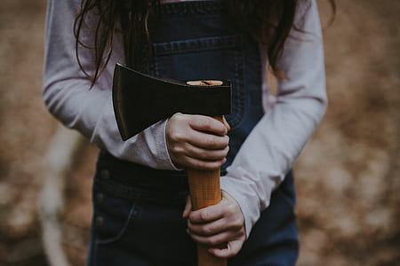 person holding axe thumbnail