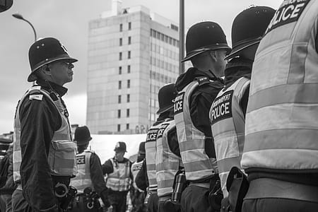 policemen standing outdoors thumbnail