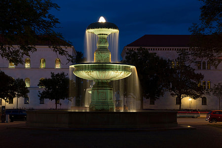 turned-on fountain during nighttime thumbnail