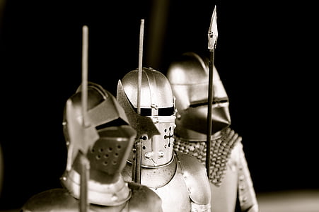 grayscale photo of three knights holding spears thumbnail
