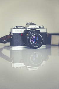 black and gray Minolta XG 3 camera closeup thumbnail