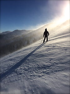 man going down on snowy mountain thumbnail