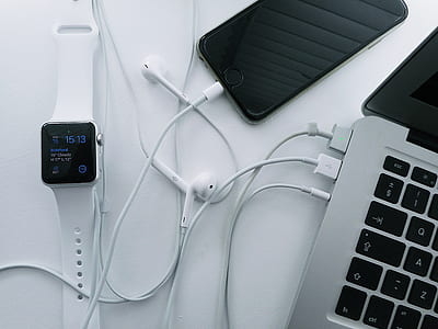 flat-lay photography of space gray iPhone 6 beside Apple Watch and MacBook Pro thumbnail