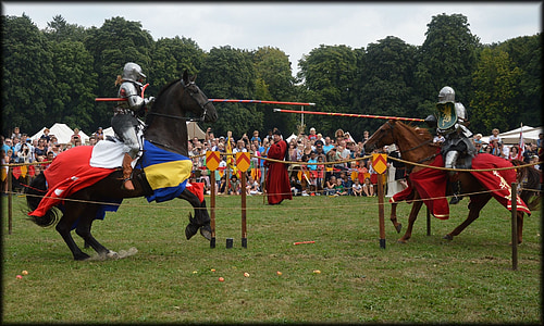 two knights riding on horses with swords thumbnail