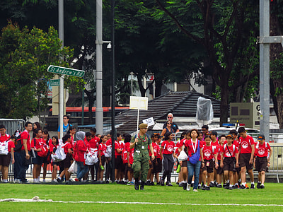 people on grass field thumbnail
