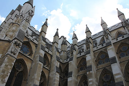 Low Angle Photo of Brown and Gray Cathedral during Daytime thumbnail