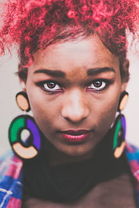 shallow focus photography of a woman with red dye hair thumbnail