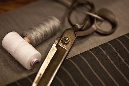 shallow focus photography of black steel scissor thumbnail